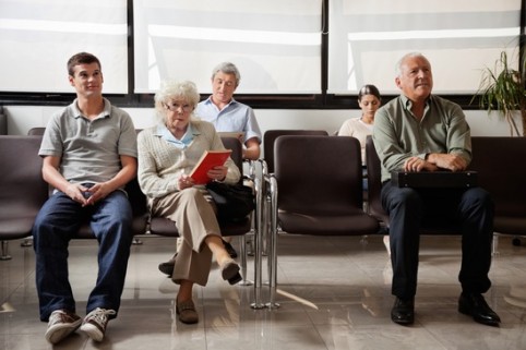 people sitting in hospital lobby xs