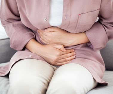 Woman Holding Stomach