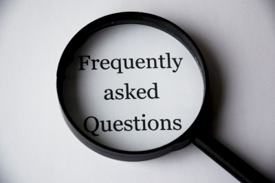 FAQ Words Written on Paper