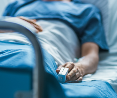 patient lying in hospital bed
