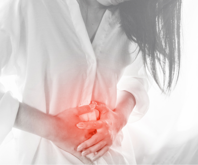 woman holding stomach